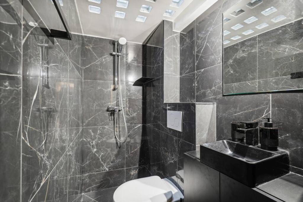 Duplex Parisien Pres Du Louvre Apartment Bagian luar foto